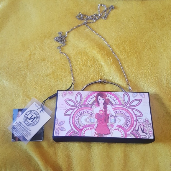 Nicole Lee Handbags - SALE‼️ Authentic Nicole Lee hard case evening handbag